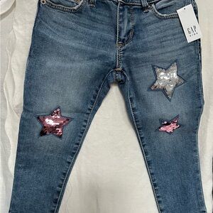 Gap super skinny girls jeans with sequin hearts.  Size 5. NWT.  Non smoking home